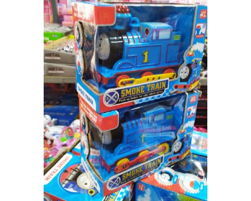 Игрушечный Паровозик Томас, Музыка, свет, пускает дым (89027)